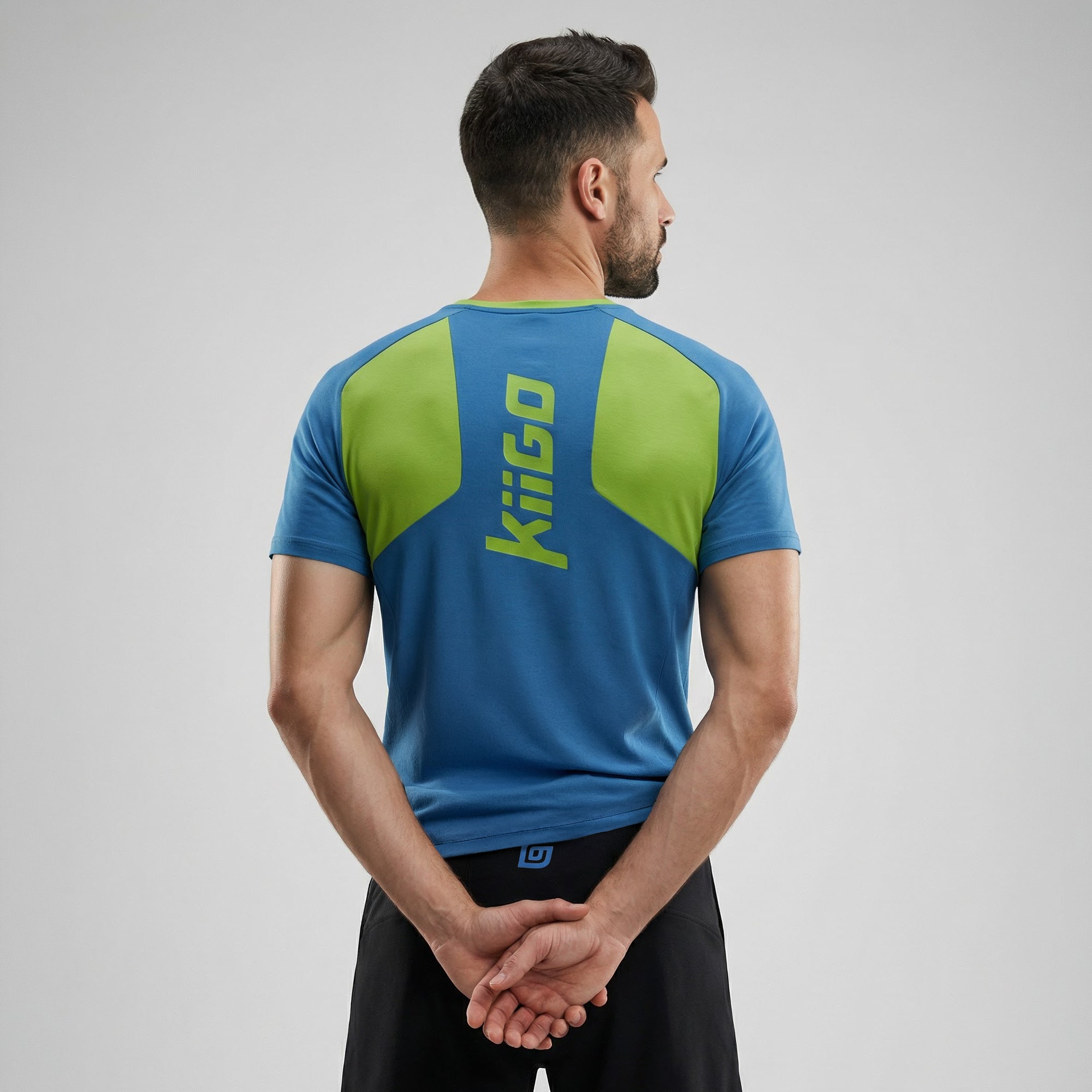 Herren Laufshirt Blau mit Lime-Einsatz – Rückseite getragen